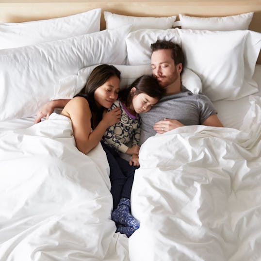 Family sleeping comfortably on the memory foam mattress