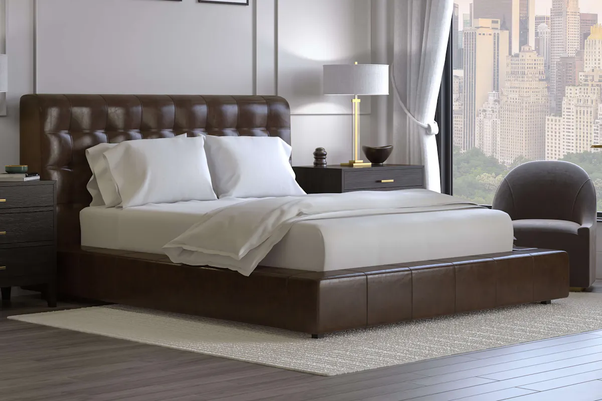 Saatva Adra leather bed frame in Espresso — low-slung platform frame in bedroom setting