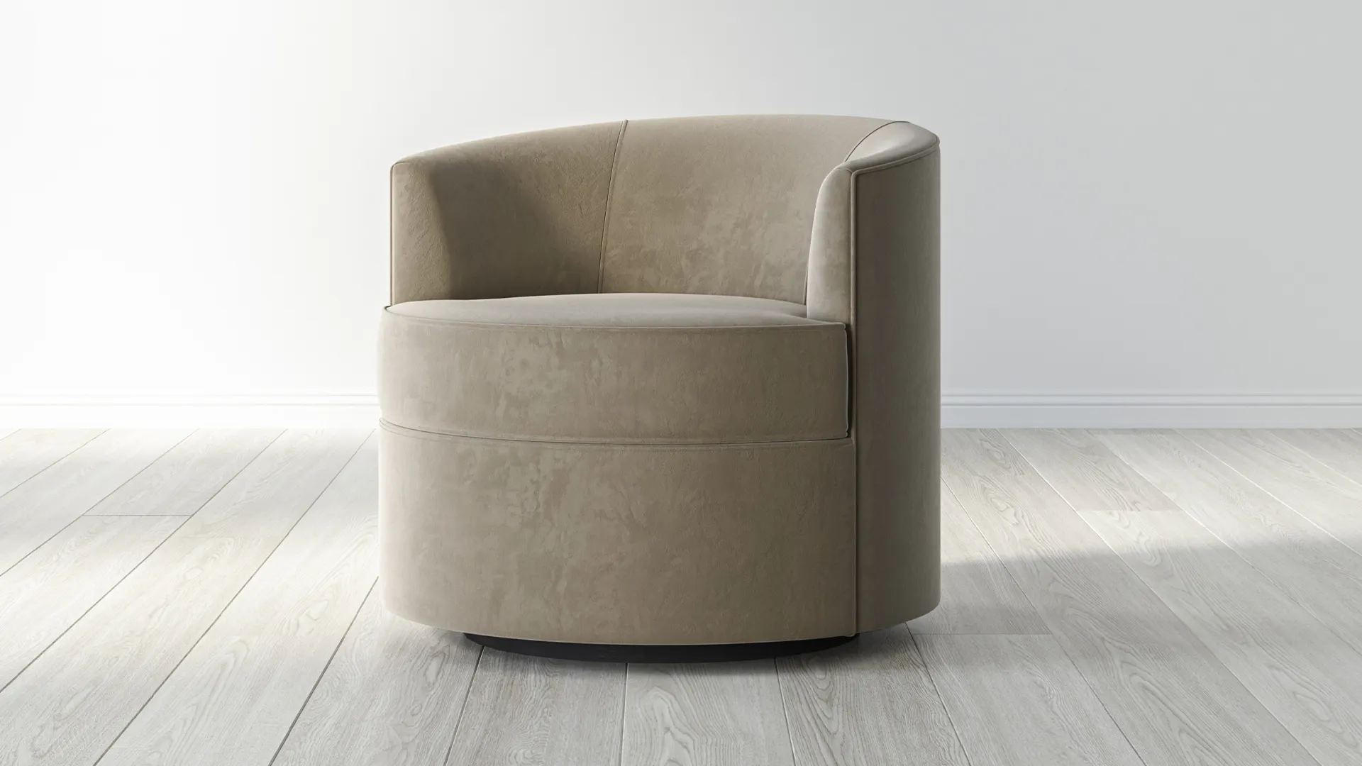 A round beige upholstered swivel chair with curved back and thick seat cushion, placed on light wooden floor.