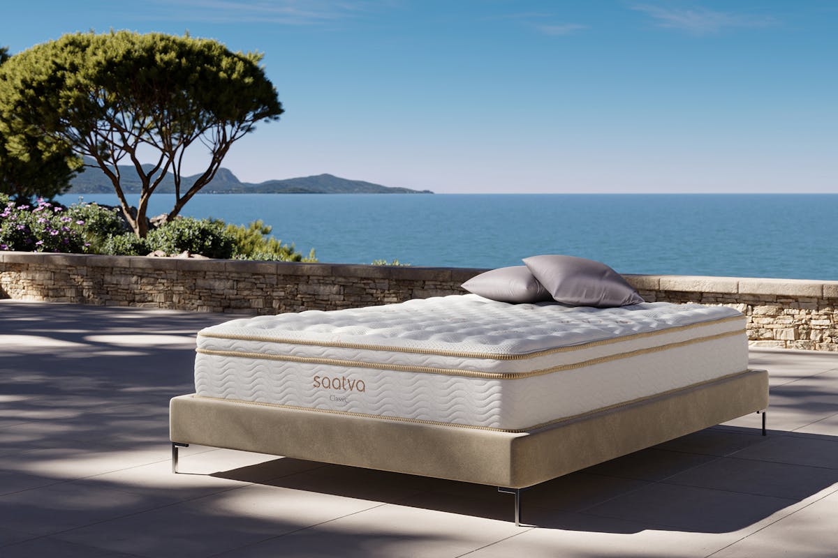 Saatva Classic luxury mattress on bed frame